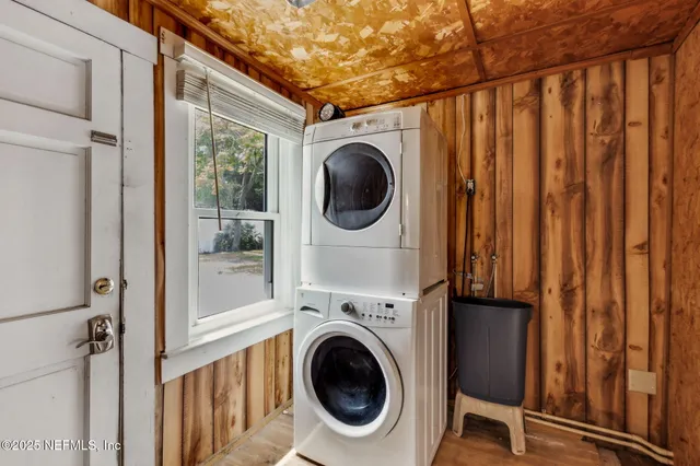 a utility room with dryer and washer