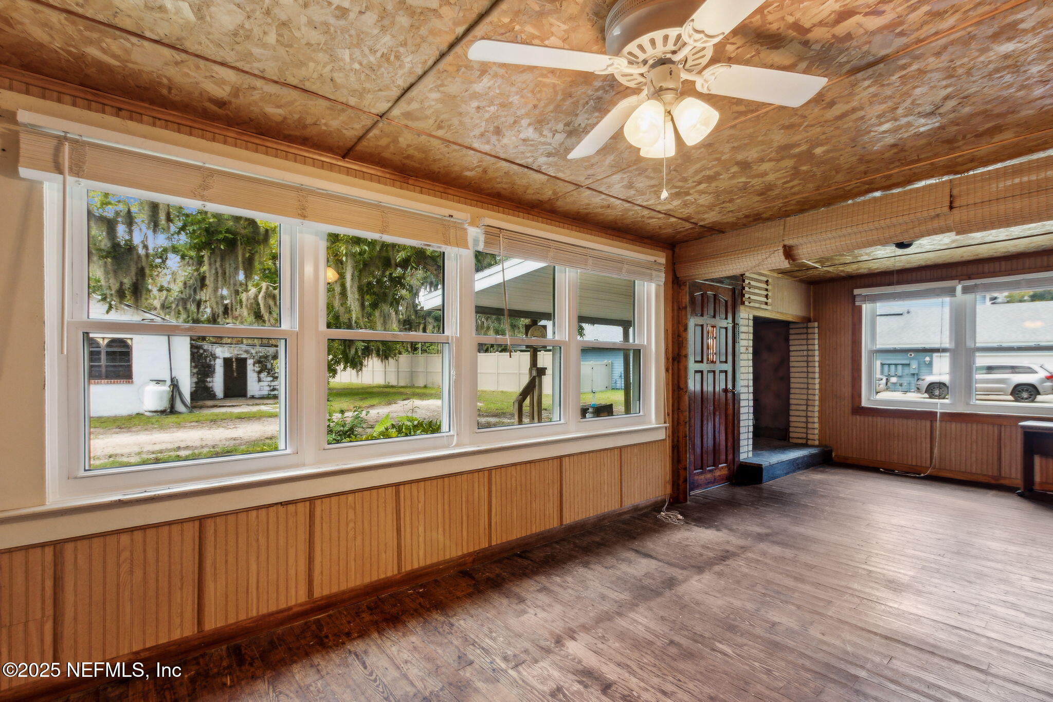 2753 Amelia Road Fernandina Beach, FL 32034 - Photo 24 of 40 a large room with a large window and furniture