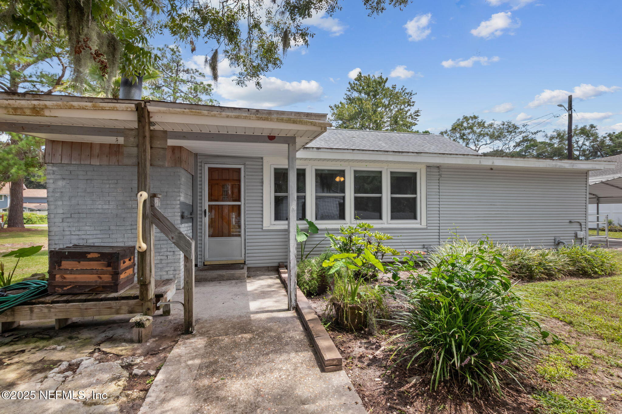 2753 Amelia Road Fernandina Beach, FL 32034 - Photo 27 of 40 a house view with a garden space