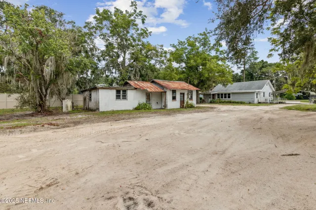 a house with trees in the background