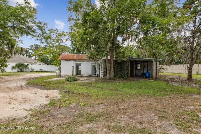 a view of a door and a window