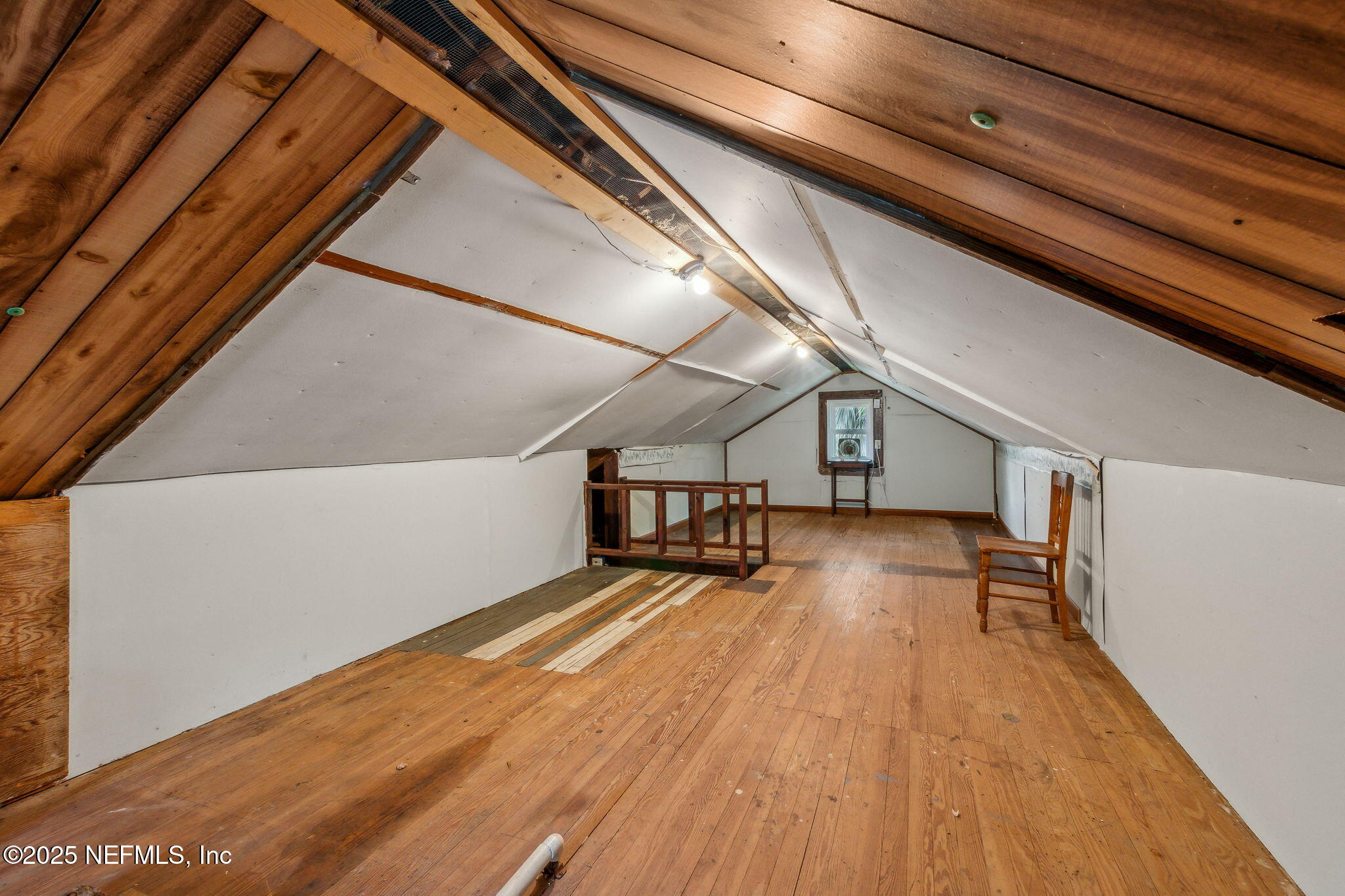 2753 Amelia Road Fernandina Beach, FL 32034 - Photo 5 of 40 a view of empty room with wooden floor