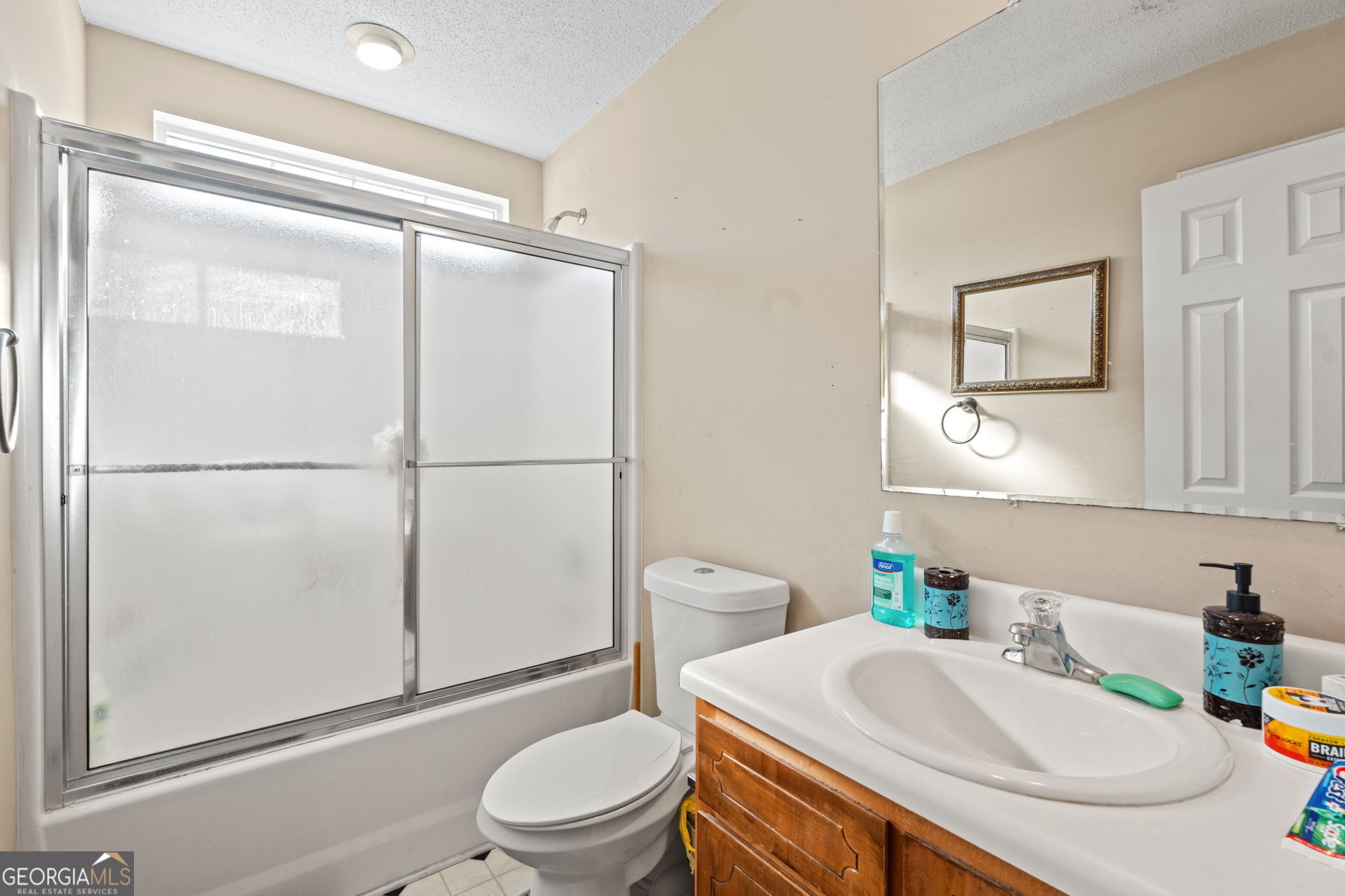 1525 Taylors Mill Road Fort Valley, GA 31030 - Photo 13 of 26 a bathroom with a sink toilet and shower