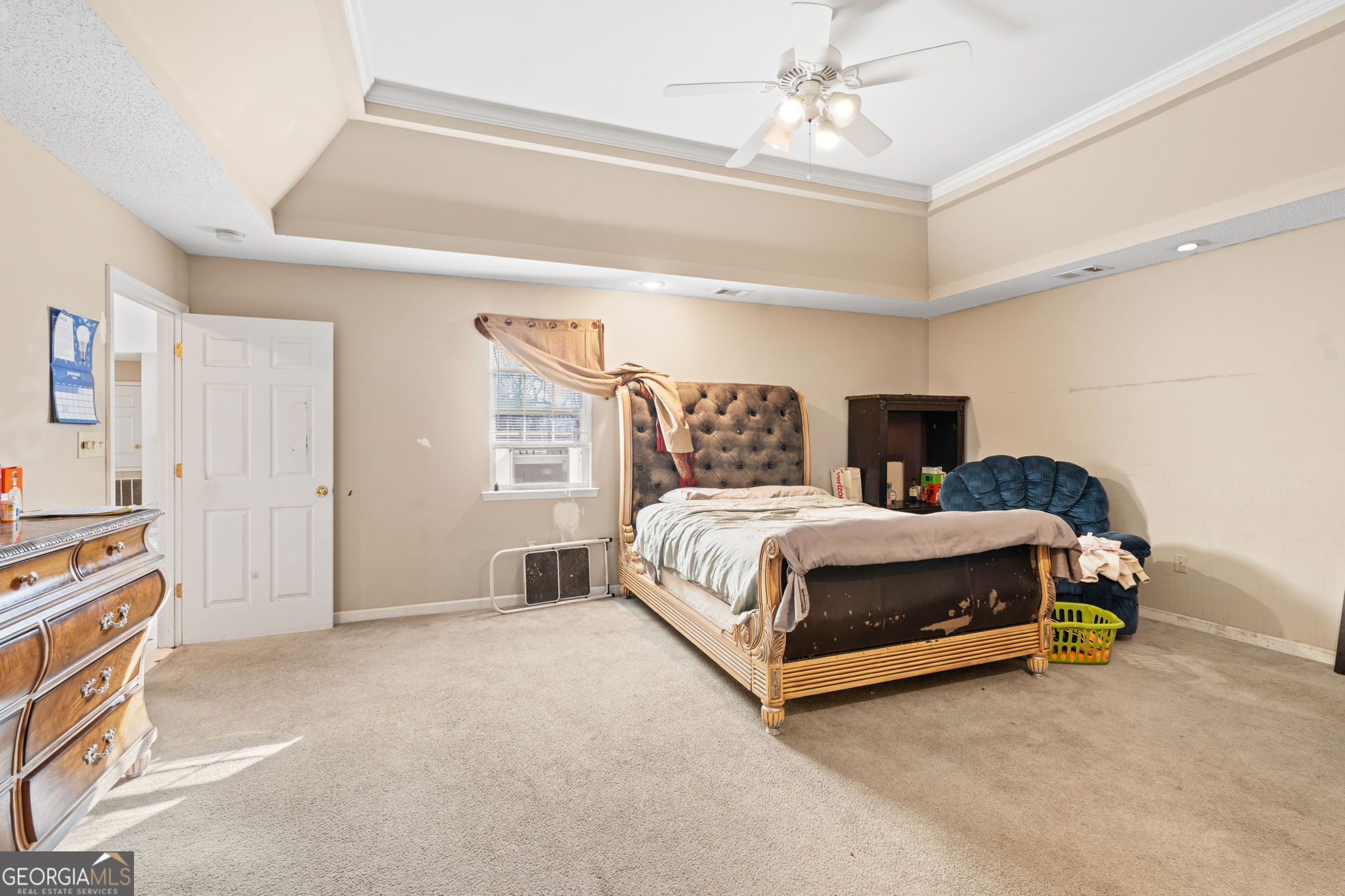 1525 Taylors Mill Road Fort Valley, GA 31030 - Photo 17 of 26 a bed room with a bed and a window