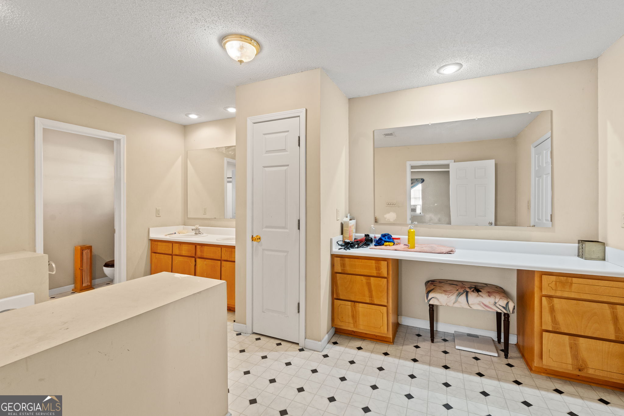 1525 Taylors Mill Road Fort Valley, GA 31030 - Photo 19 of 26 a room with a bed and a cabinets