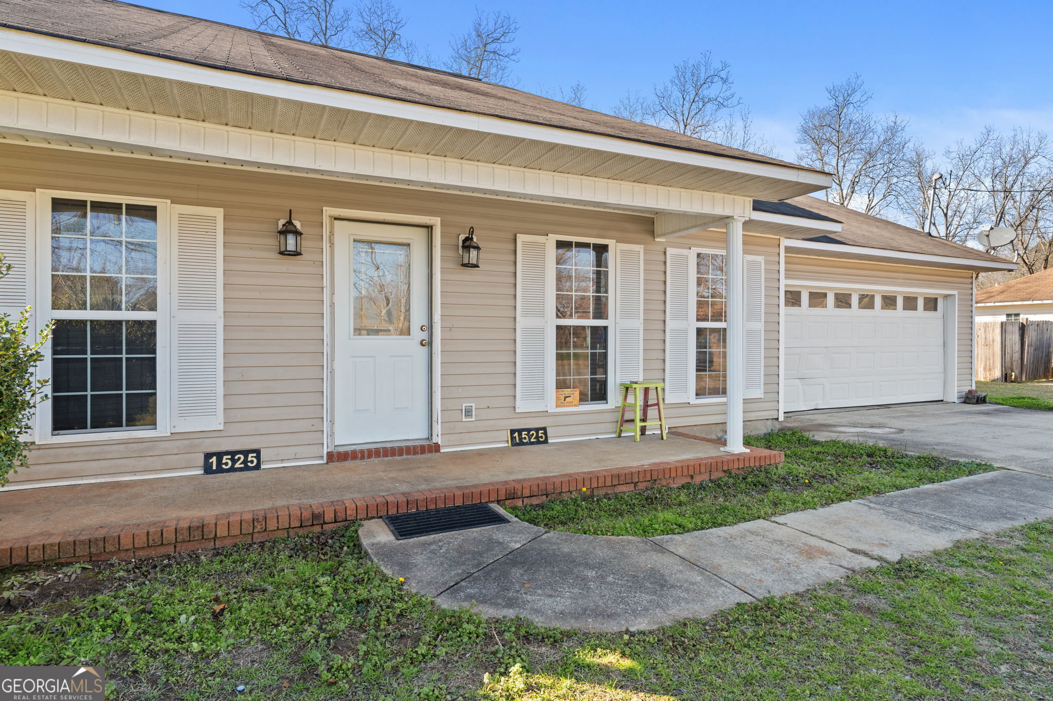1525 Taylors Mill Road Fort Valley, GA 31030 - Photo 3 of 26 a front view of a house with porch and yard