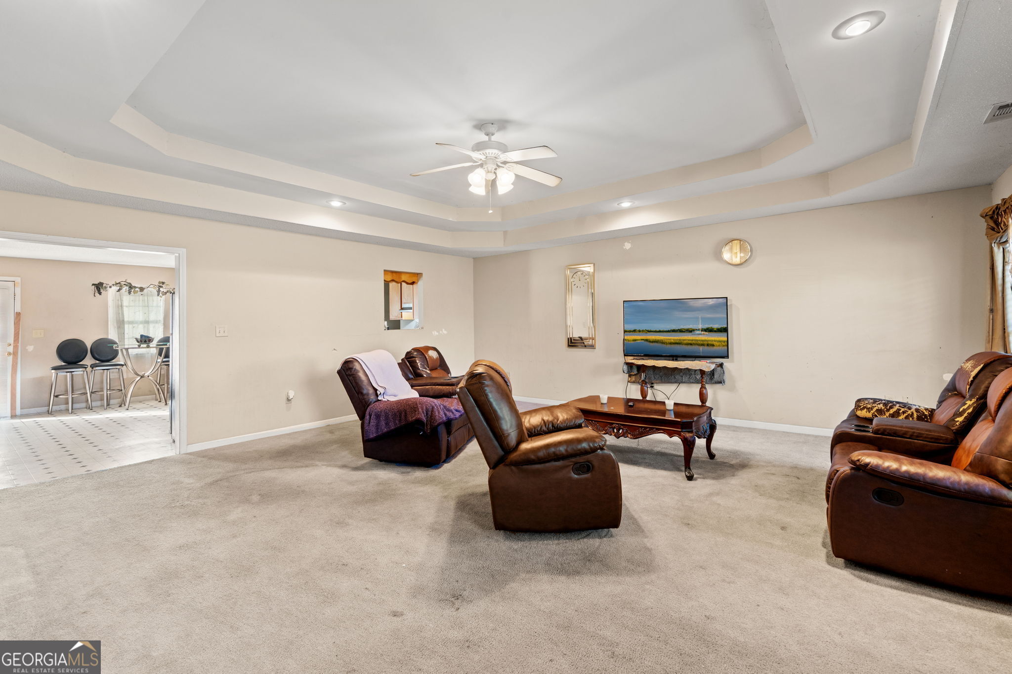 1525 Taylors Mill Road Fort Valley, GA 31030 - Photo 4 of 26 a living room with furniture a couch and a flat screen tv