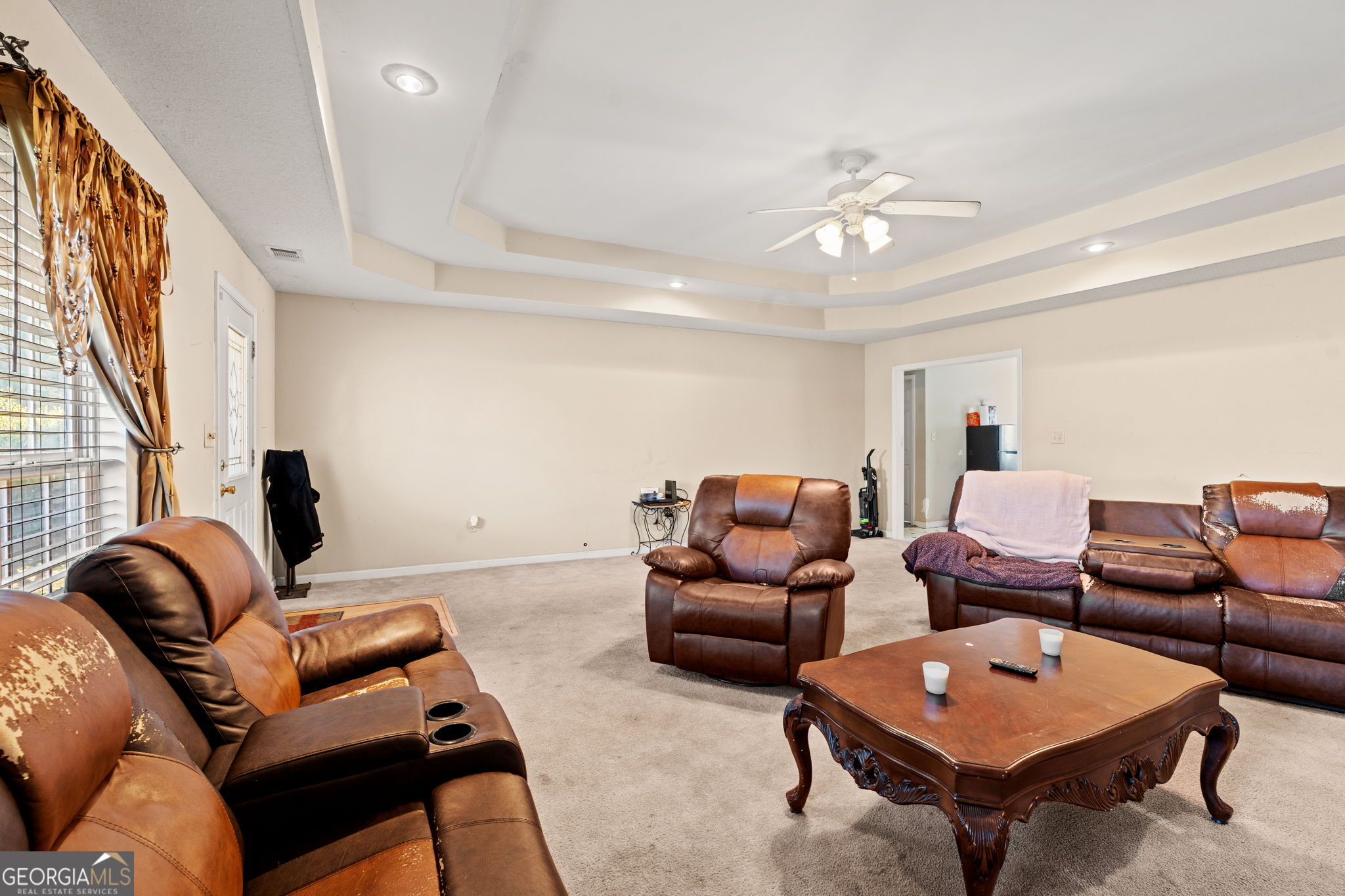 1525 Taylors Mill Road Fort Valley, GA 31030 - Photo 6 of 26 a living room with furniture a rug and a window