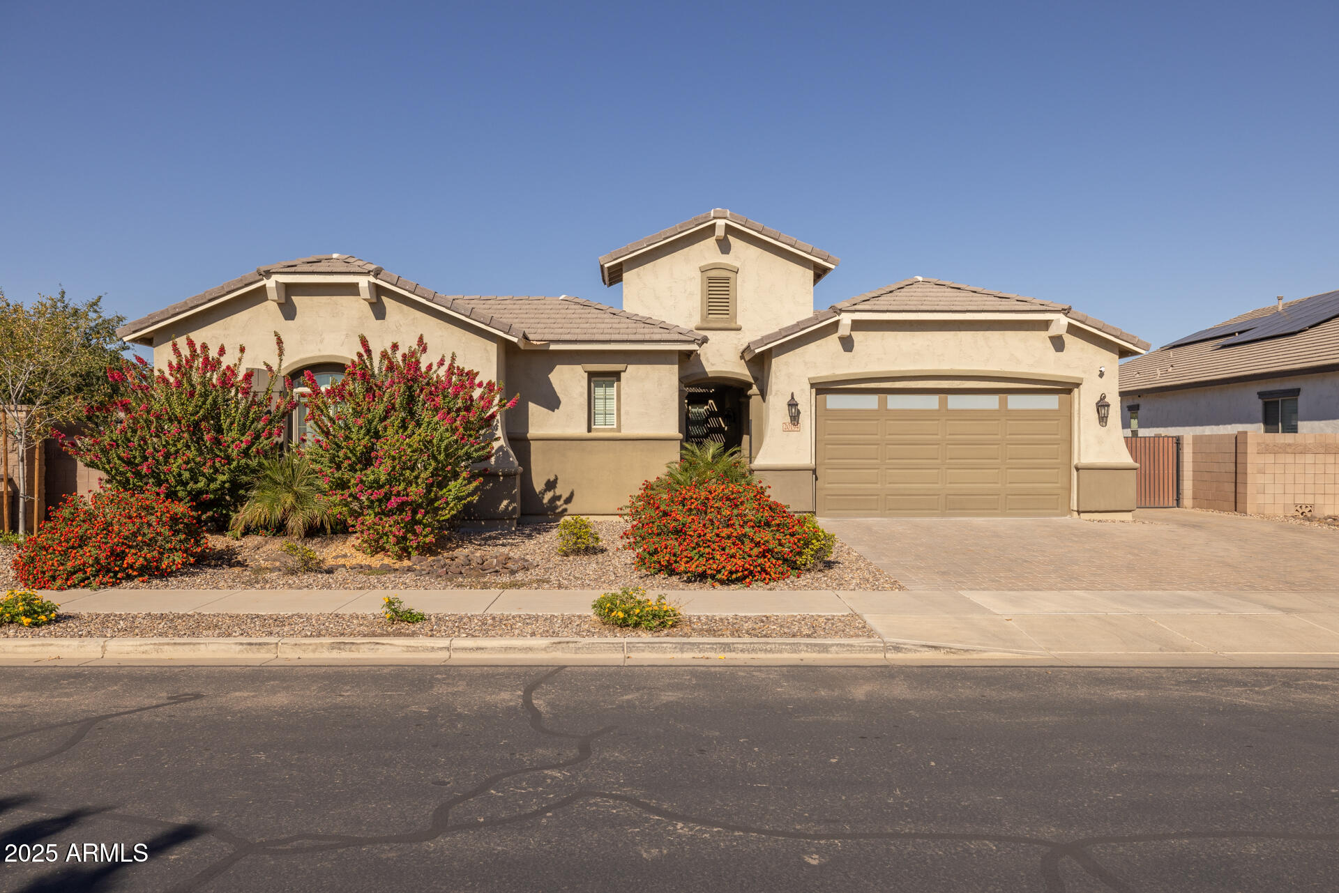 20194 East Raven Drive Queen Creek, AZ 85142 - Photo 1 of 39 a front view of a house with a yard