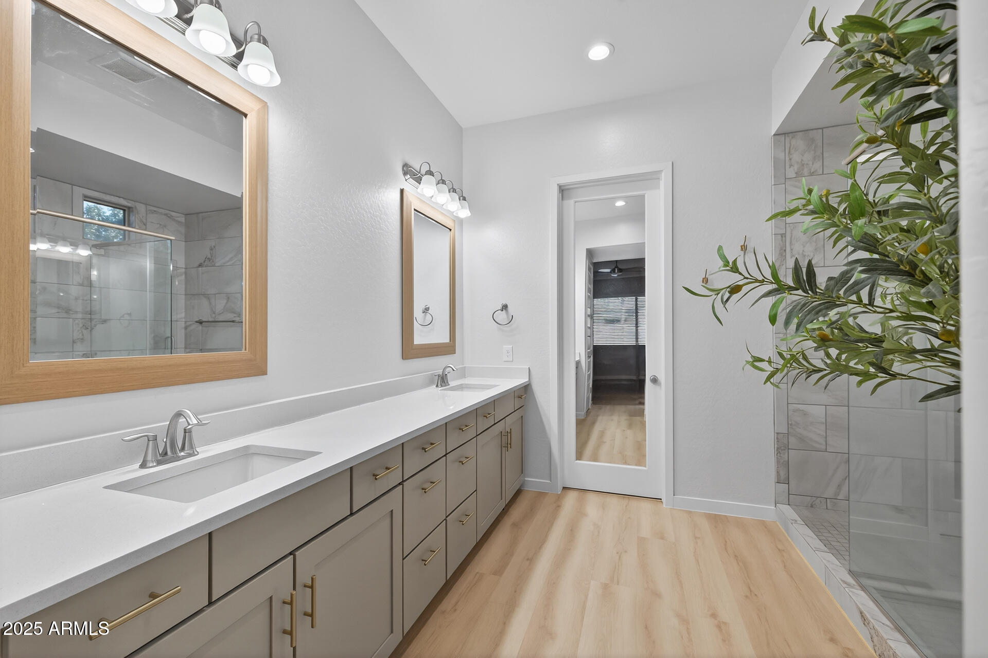 20194 East Raven Drive Queen Creek, AZ 85142 - Photo 20 of 39 a bathroom with a sink and a mirror