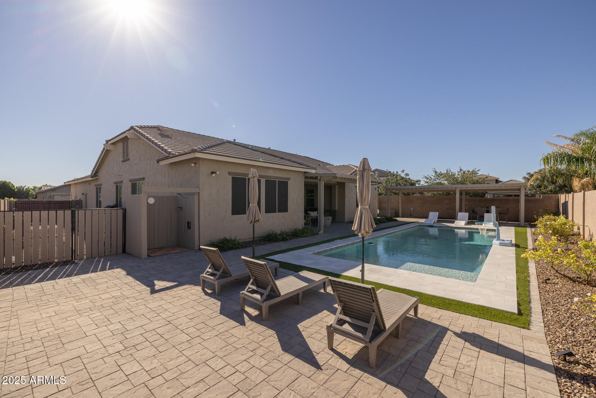 20194 East Raven Drive Queen Creek, AZ 85142 - Photo 28 of 39 a view of a house with pool and sitting area