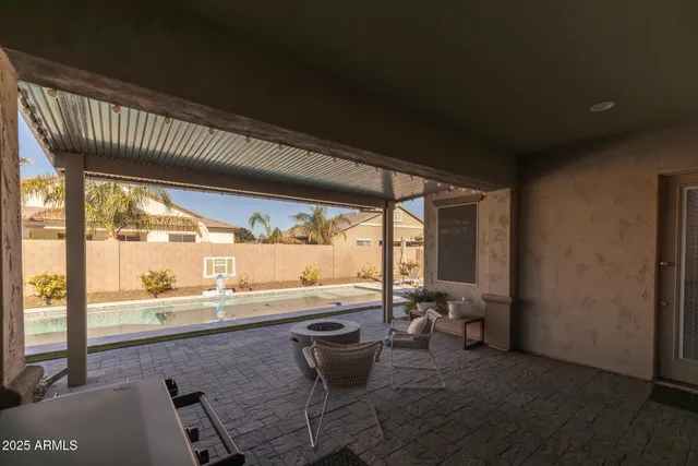 a room with furniture and a large window