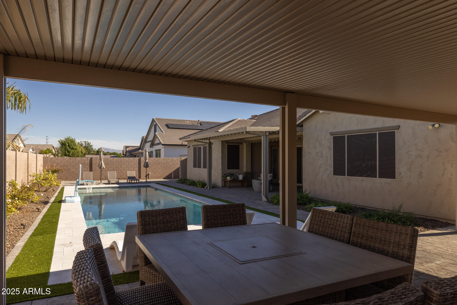 20194 East Raven Drive Queen Creek, AZ 85142 - Photo 32 of 39 a patio with table and chairs
