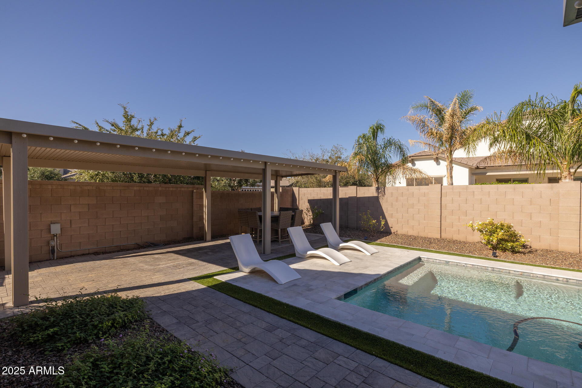 20194 East Raven Drive Queen Creek, AZ 85142 - Photo 36 of 39 a view of a roof deck with potted plants