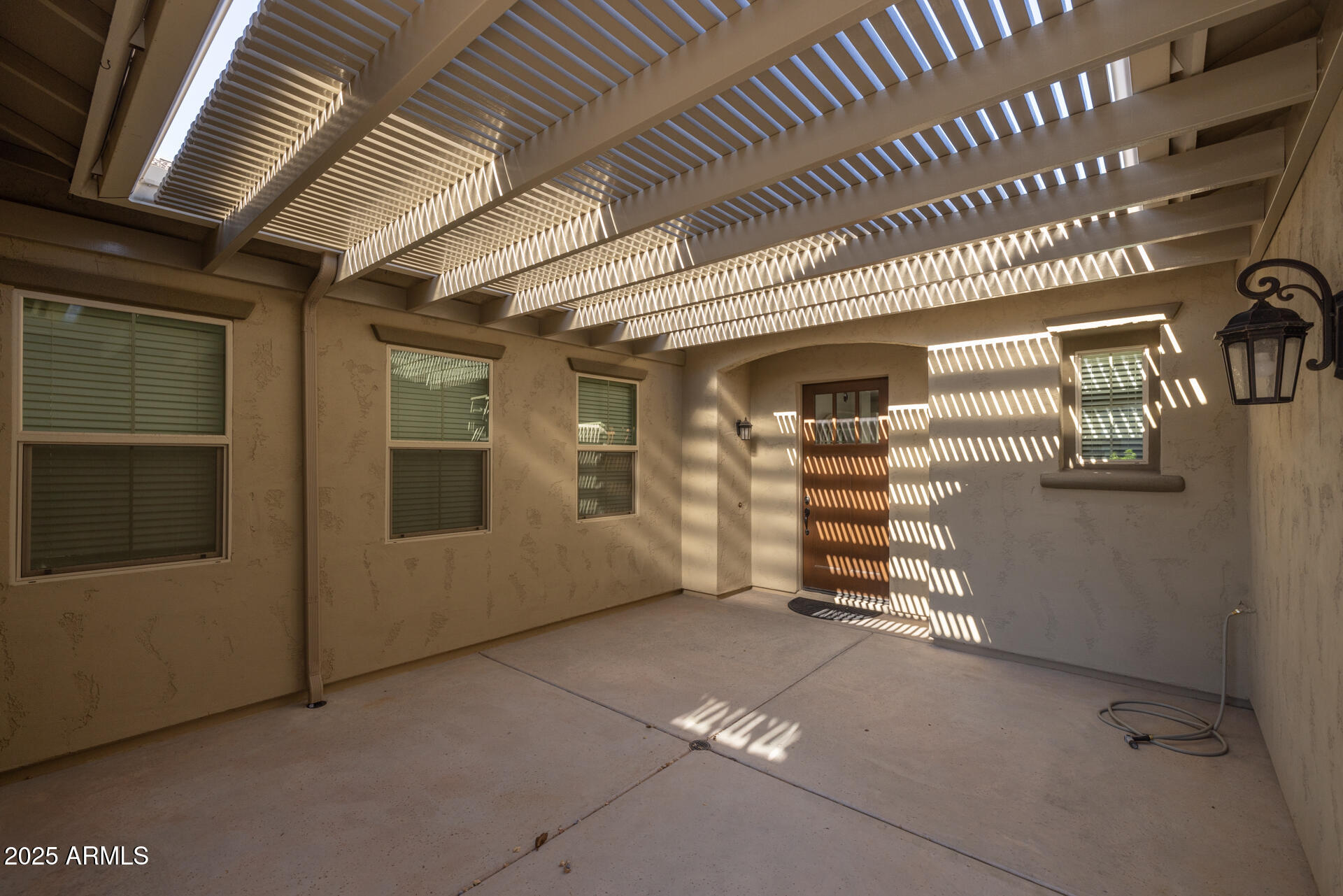 20194 East Raven Drive Queen Creek, AZ 85142 - Photo 4 of 39 a view of an empty room with stairs and furniture