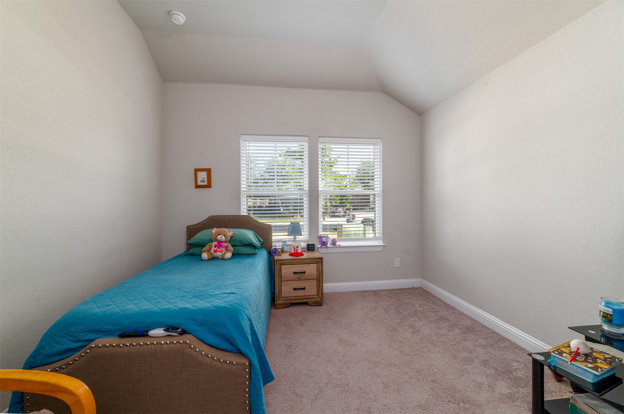 273 Rimrock Court Bastrop, TX 78602 - Photo 11 of 17 a bedroom with furniture and a window