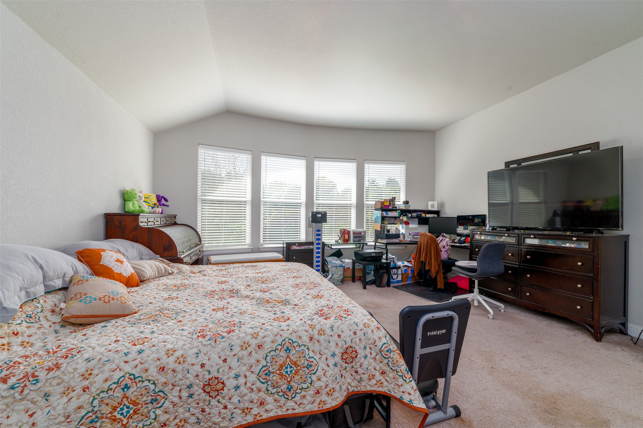 273 Rimrock Court Bastrop, TX 78602 - Photo 14 of 17 a bedroom with a bed a large window and flat screen tv