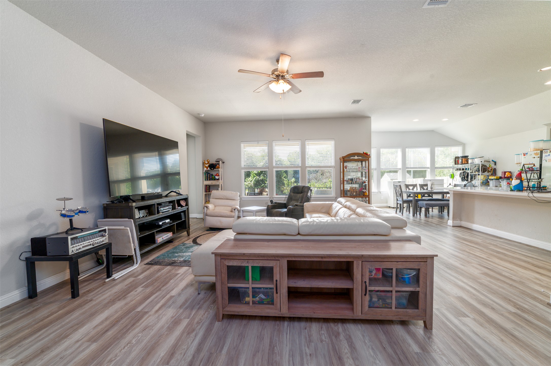 273 Rimrock Court Bastrop, TX 78602 - Photo 2 of 17 a view of a dining room with furniture window and wooden floor