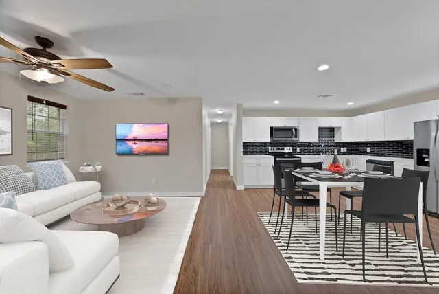 a view of a dining room with furniture