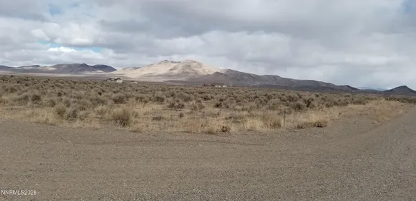 a view of ocean and mountain
