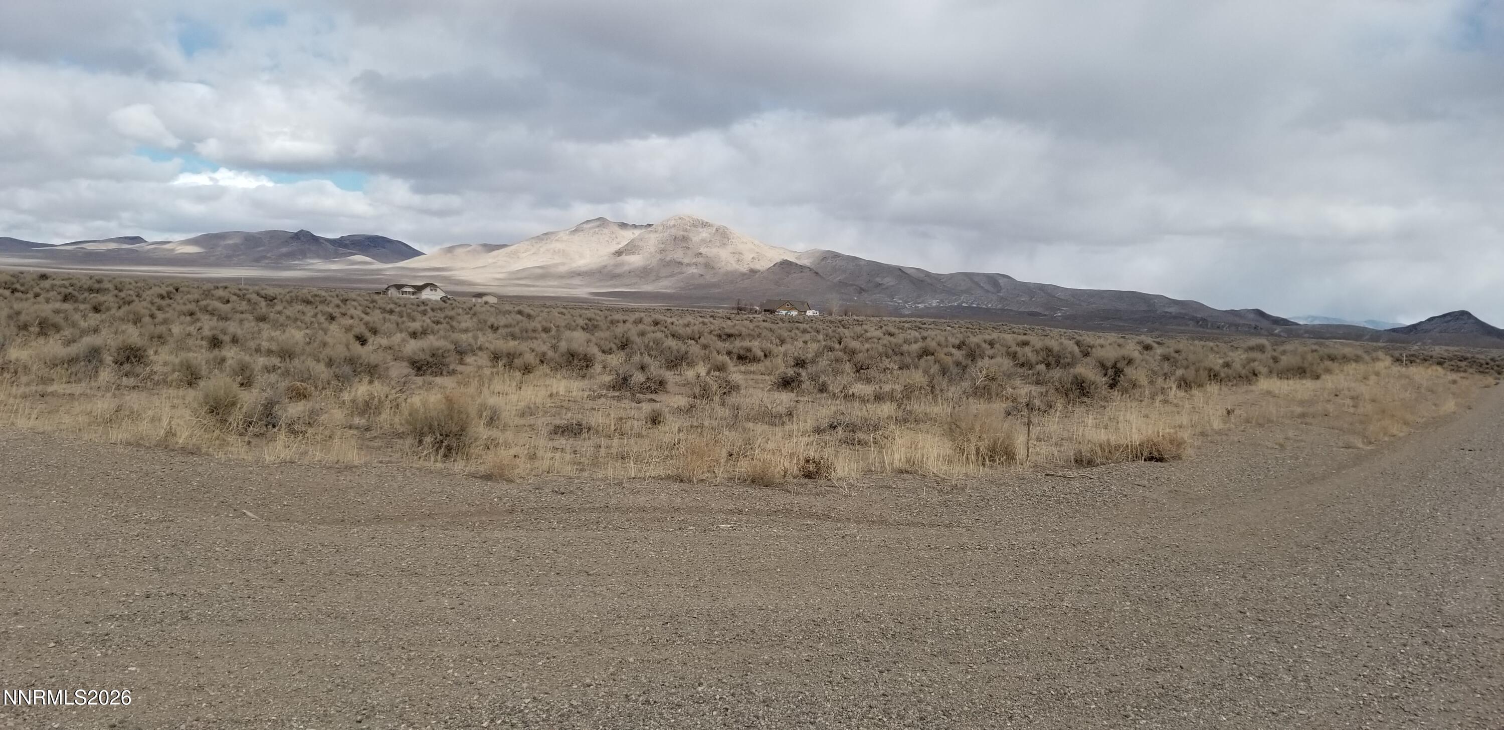 a view of ocean and mountain