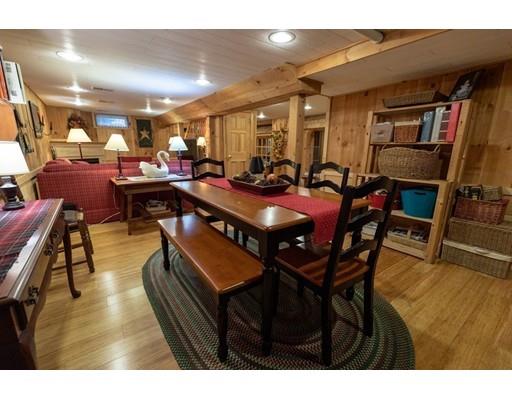 87 Saundersdale Road Charlton, MA 01507 - Photo 19 of 30 a dinning area with furniture and wooden floor
