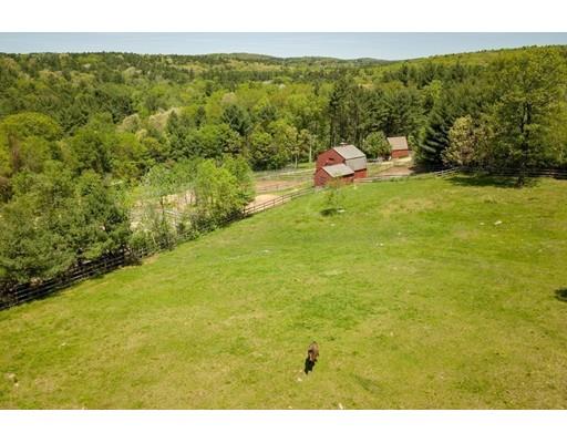 87 Saundersdale Road Charlton, MA 01507 - Photo 29 of 30 a view of a lake with a city