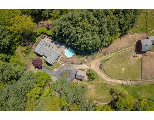 87 Saundersdale Road Charlton, MA 01507 - Photo 4 of 30 a view of a fire pit with a yard