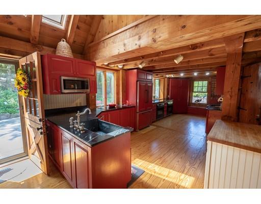 87 Saundersdale Road Charlton, MA 01507 - Photo 6 of 30 a kitchen with stainless steel appliances granite countertop a stove a sink and a microwave