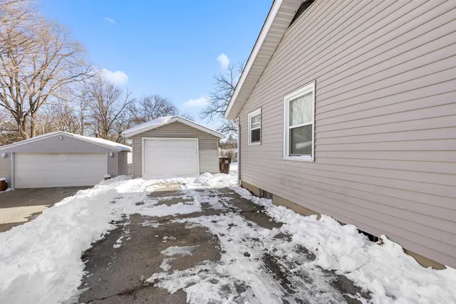 a view of a house with a snow