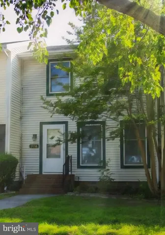 a front view of house with yard