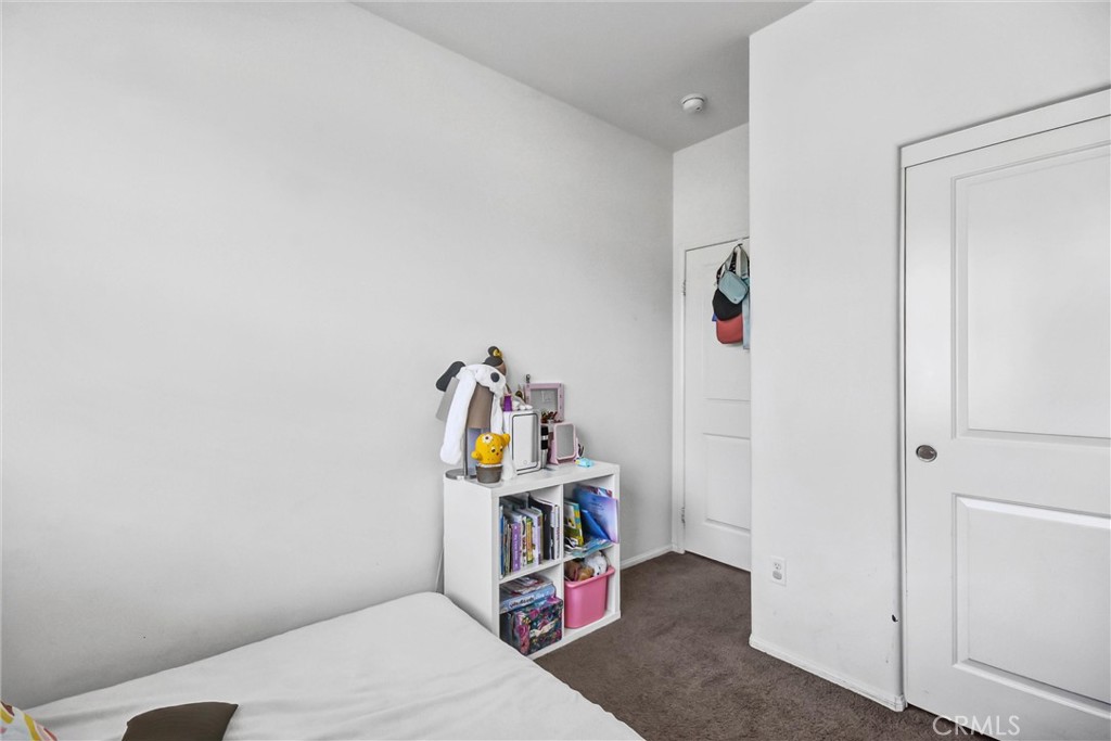 827 East Promenade, Unit E Azusa, CA 91702 - Photo 21 of 32 a room with storage and utility