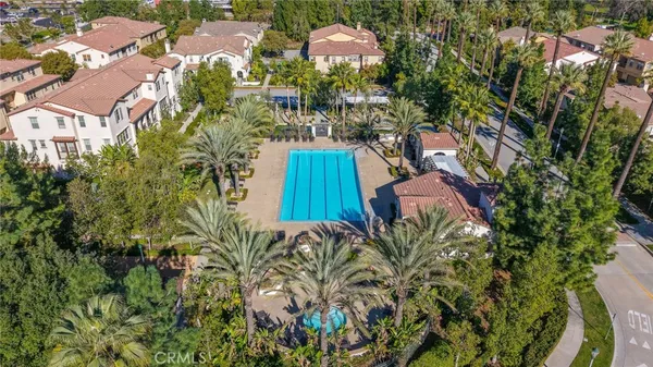 a view of swimming pool with chairs