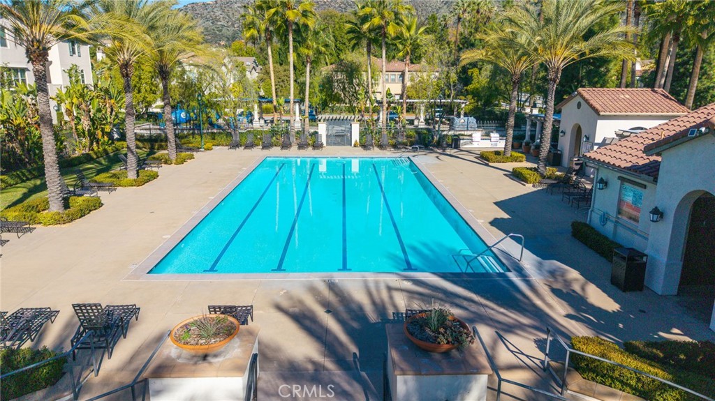 827 East Promenade, Unit E Azusa, CA 91702 - Photo 29 of 32 a view of swimming pool with chairs