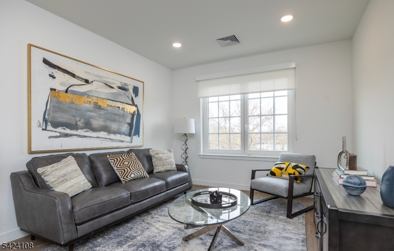 558 Market Street Newark, NJ 07105 - Photo 7 of 17 a living room with furniture and a window