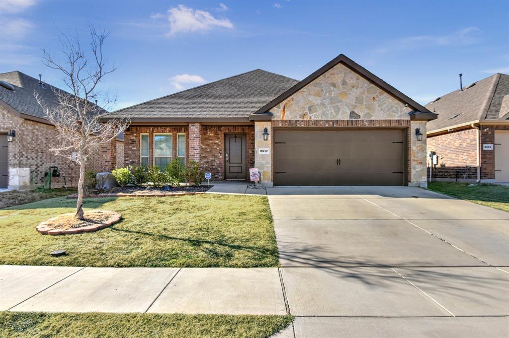 2817 Ainsworth Road Aubrey, TX 76227 - Photo 1 of 1 a front view of a house with garden