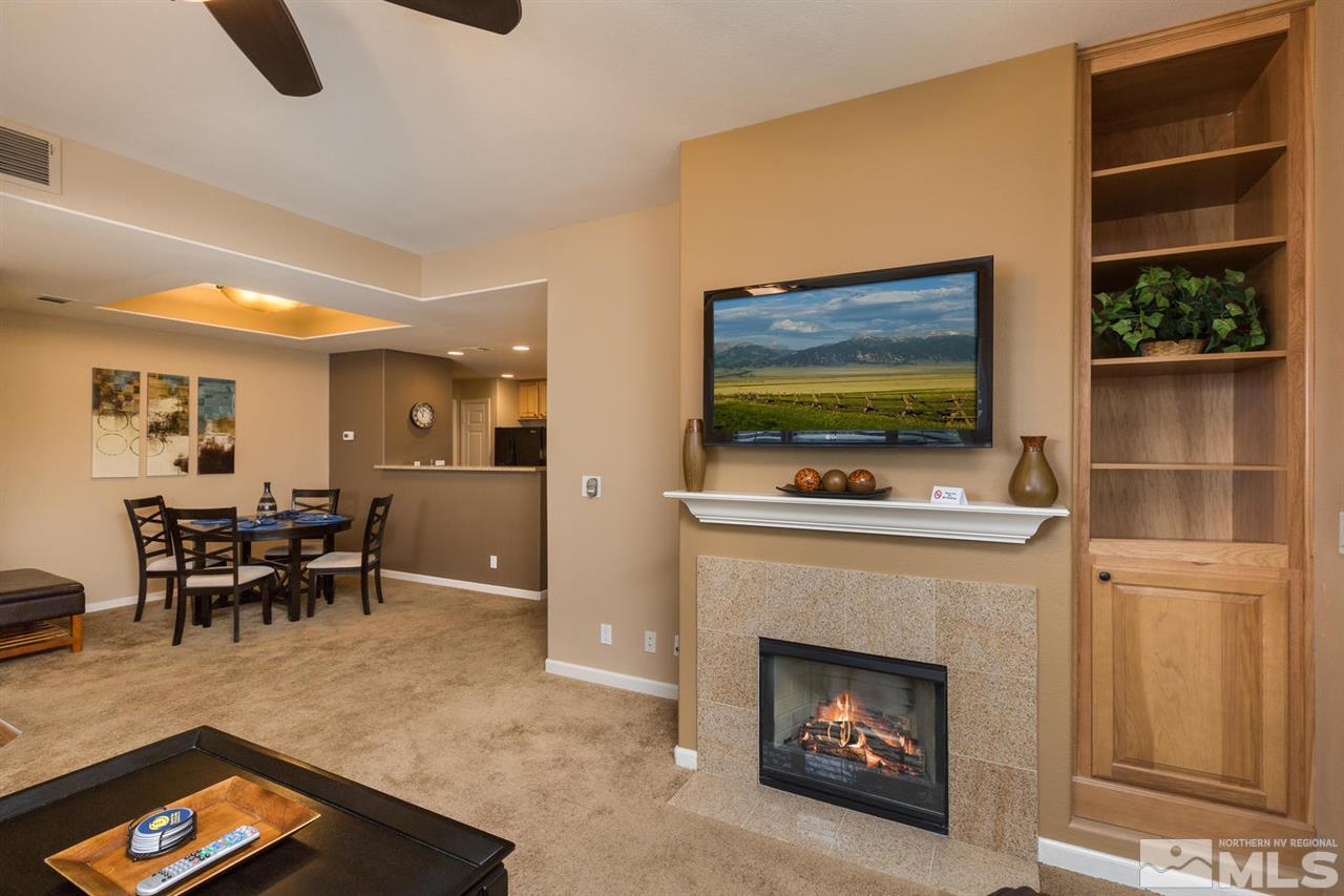 900 S, Unit 3114 Reno, NV 89521 - Photo 1 of 18 a living room with furniture a flat screen tv and a fireplace