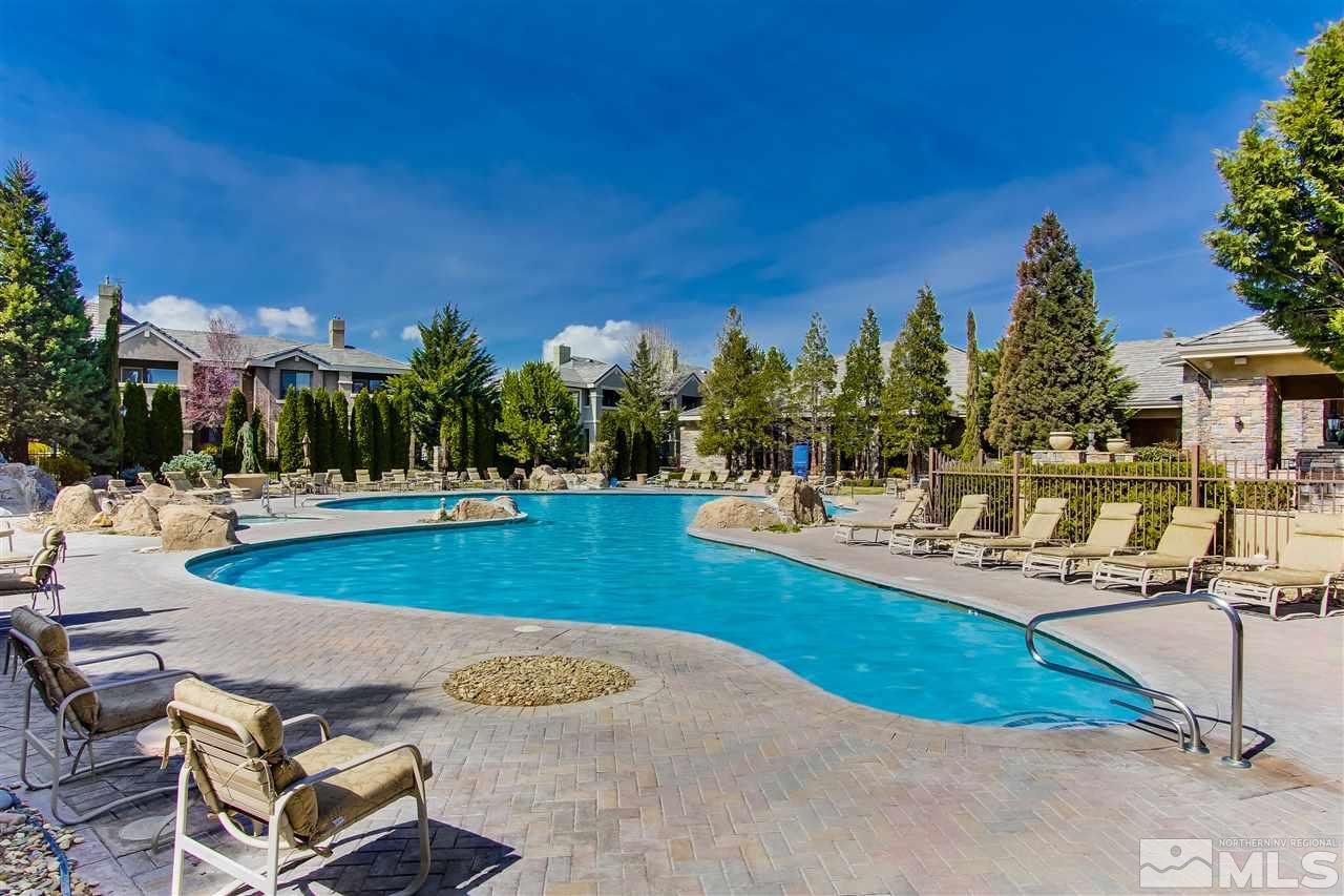 900 S, Unit 3114 Reno, NV 89521 - Photo 12 of 18 a view of a swimming pool with an outdoor space and seating area