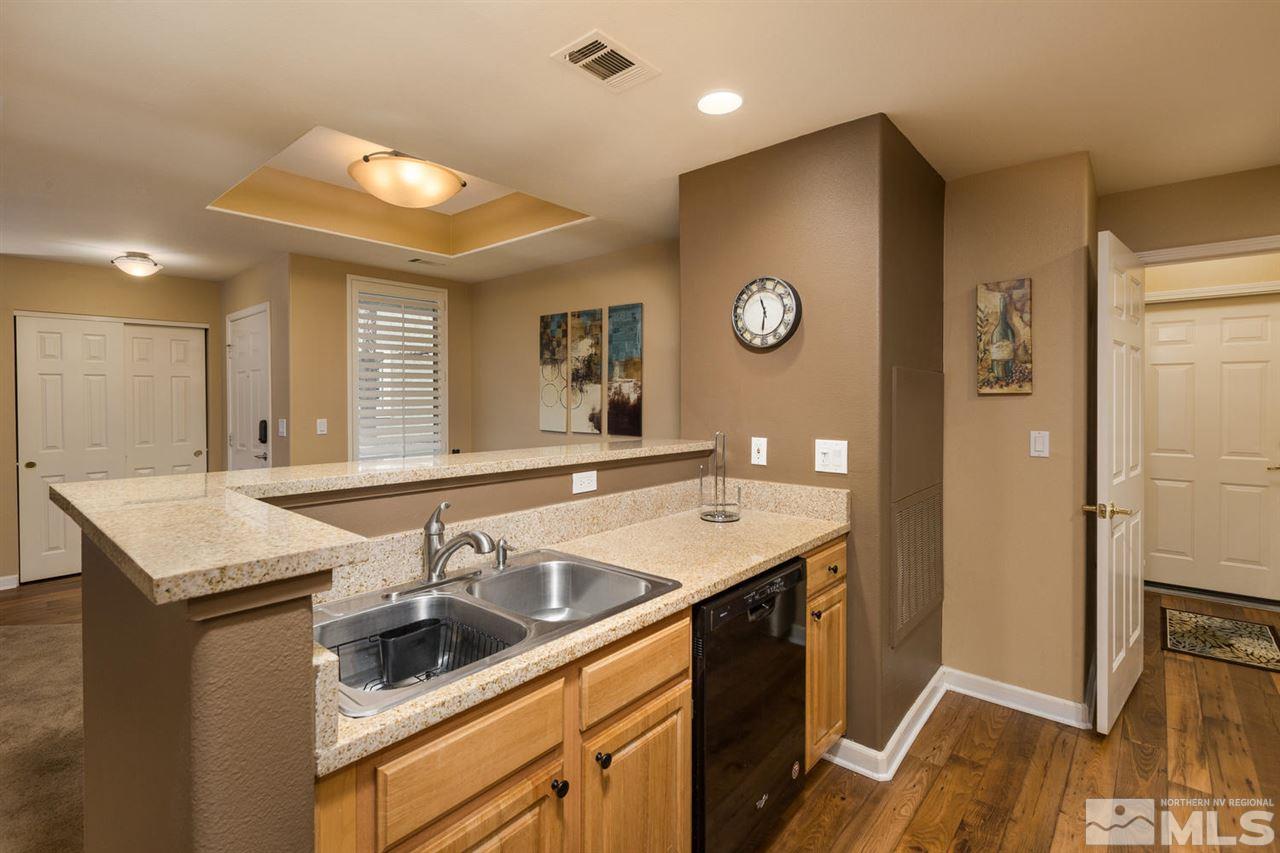 900 S, Unit 3114 Reno, NV 89521 - Photo 3 of 18 a kitchen with a sink a stove and a refrigerator