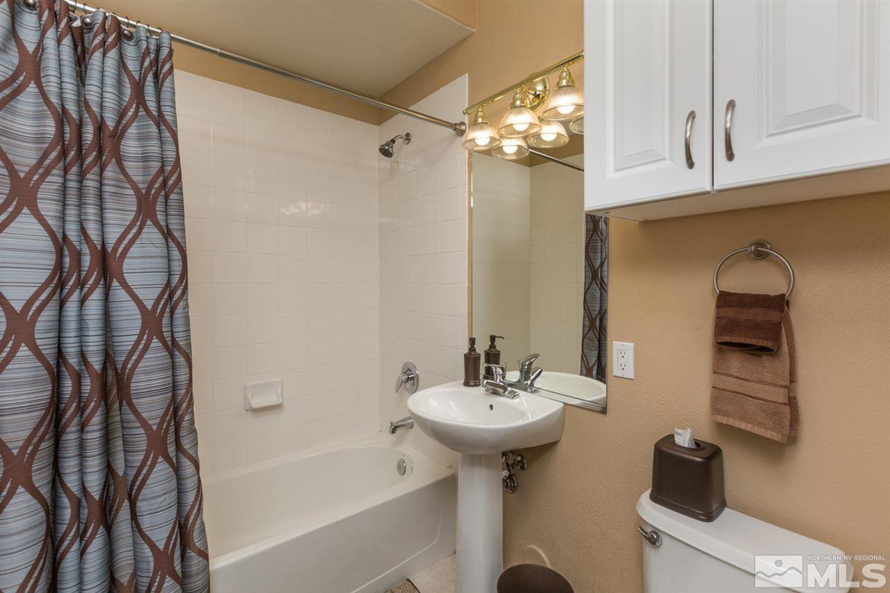 900 S, Unit 3114 Reno, NV 89521 - Photo 7 of 18 a bathroom with a sink toilet and shower