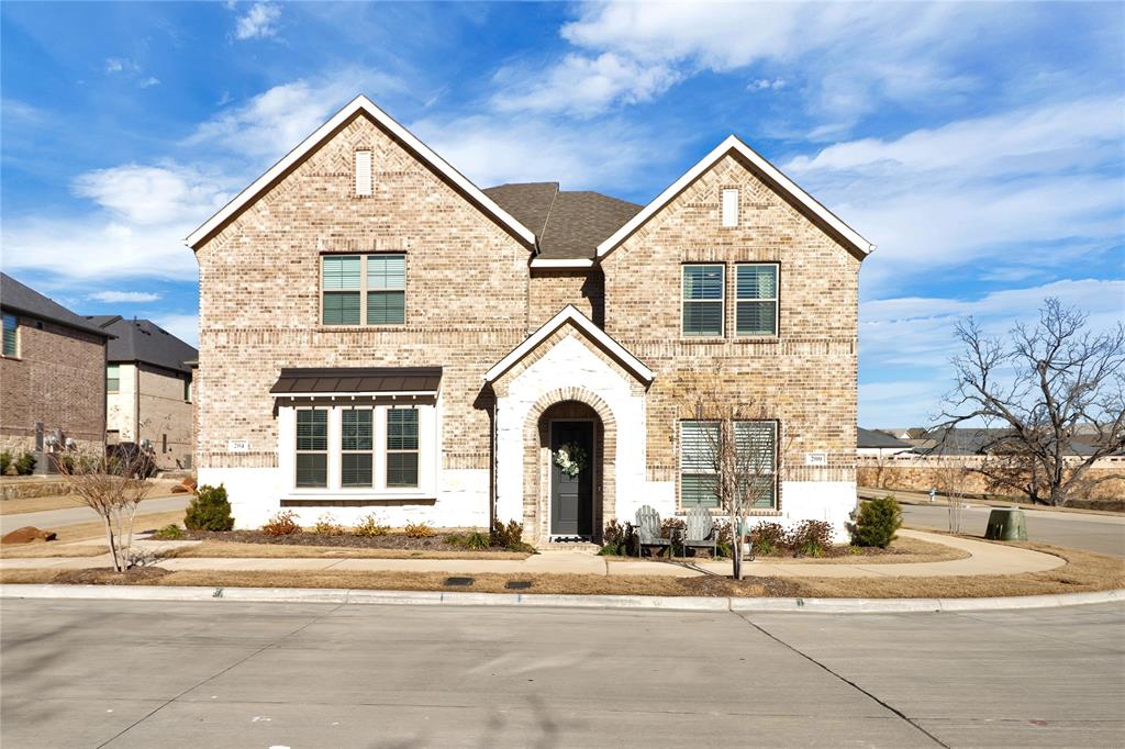 200 Spring Hill Road Flower Mound, TX 75028 - Photo 1 of 1 a front view of a house with a yard