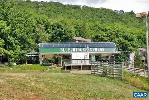 a sign broad on the side of a road