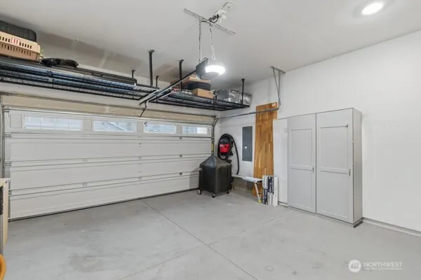 a view of a chairs and table in the garden