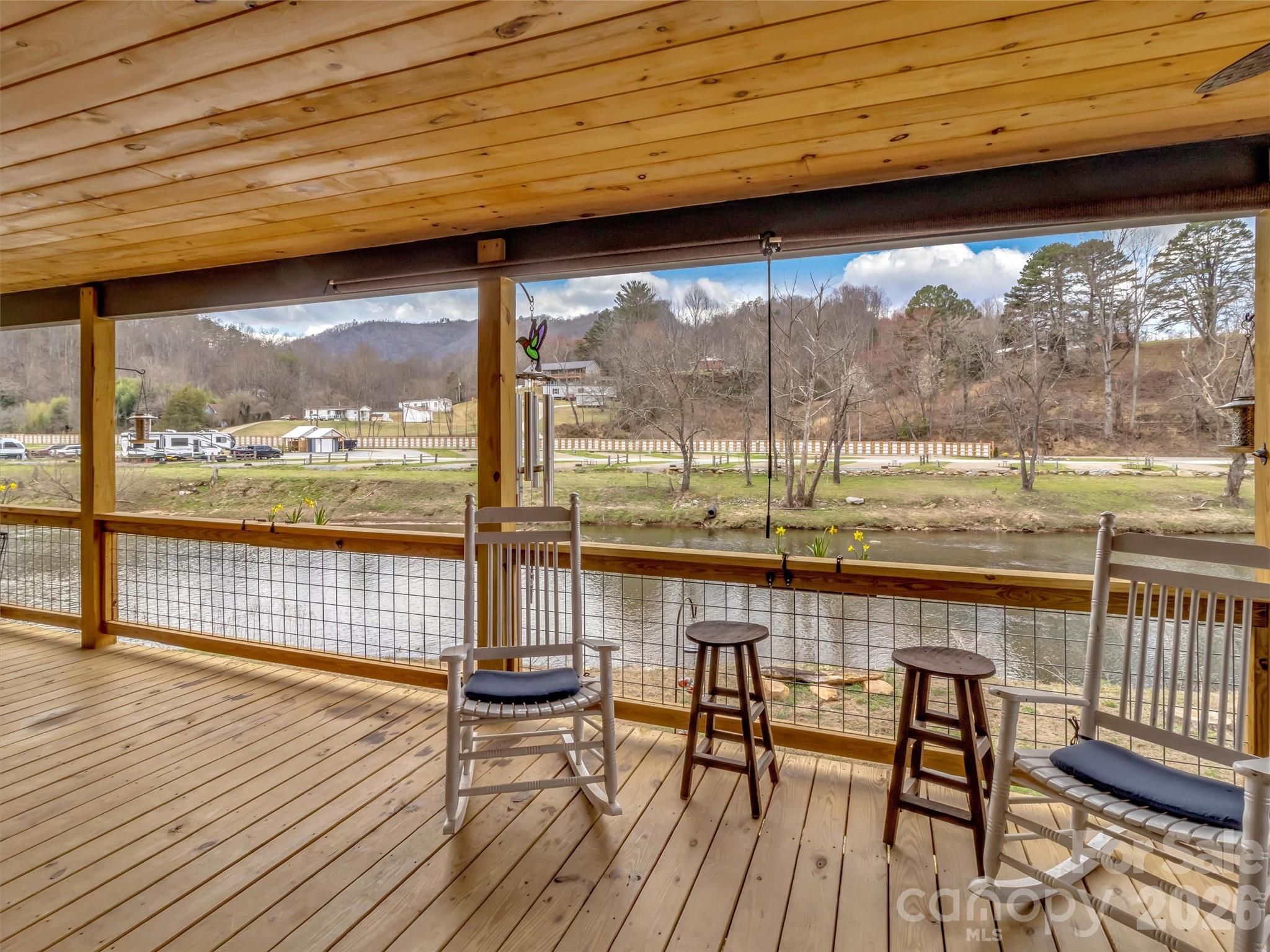 522 North River Road Sylva, NC 28779 - Photo 2 of 39 a view of a room with wooden floor and outdoor seating