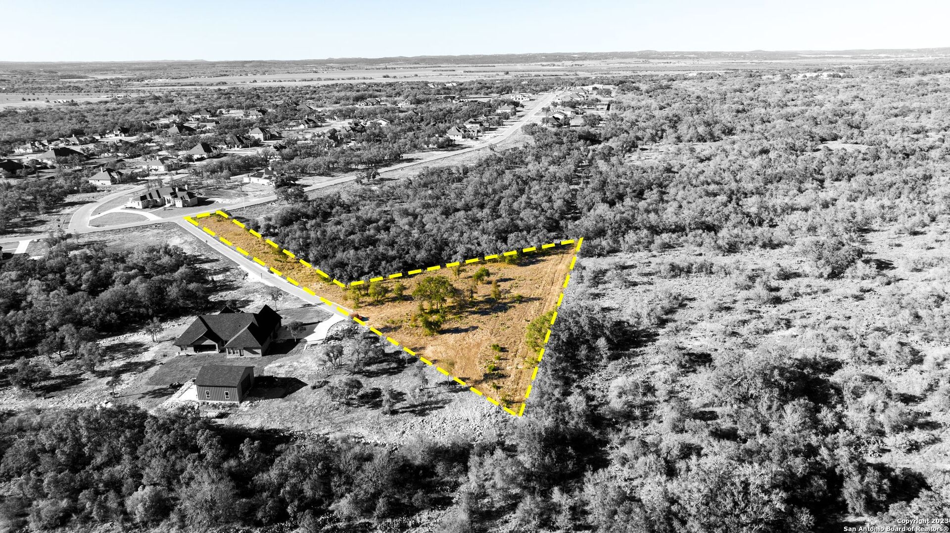 Lot 20 Stone Loop Castroville, TX 78009 - Photo 13 of 17 an aerial view of a house with a yard