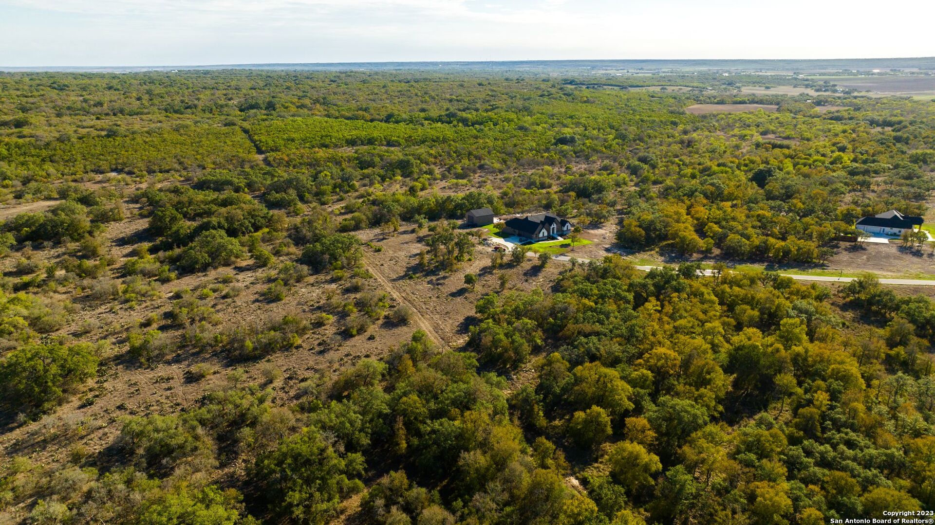 Lot 20 Stone Loop Castroville, TX 78009 - Photo 16 of 17 a view of a city with an ocean
