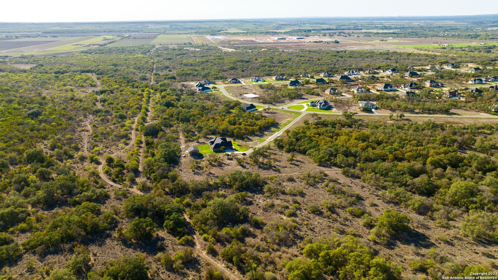 Lot 20 Stone Loop Castroville, TX 78009 - Photo 7 of 17 an aerial view of multiple house