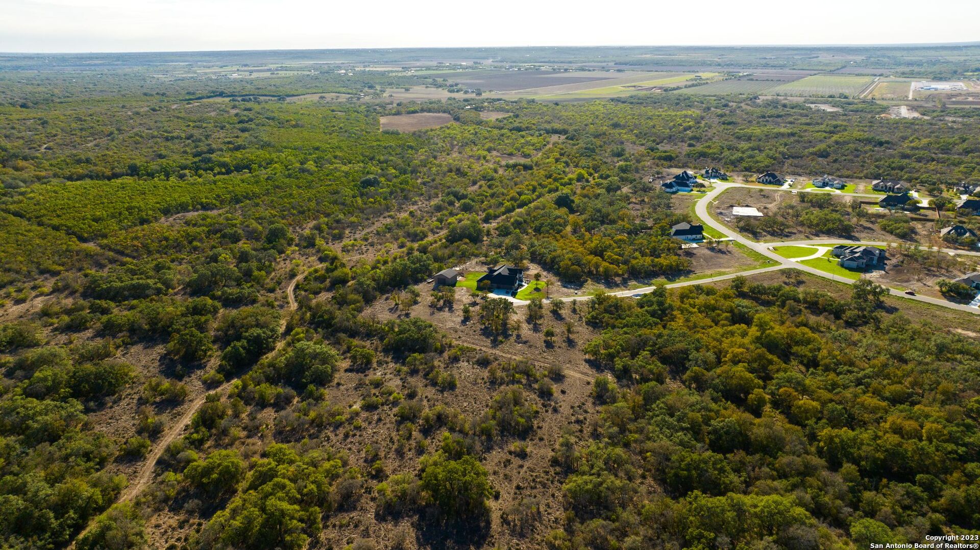 Lot 20 Stone Loop Castroville, TX 78009 - Photo 9 of 17 a view of a city with an ocean