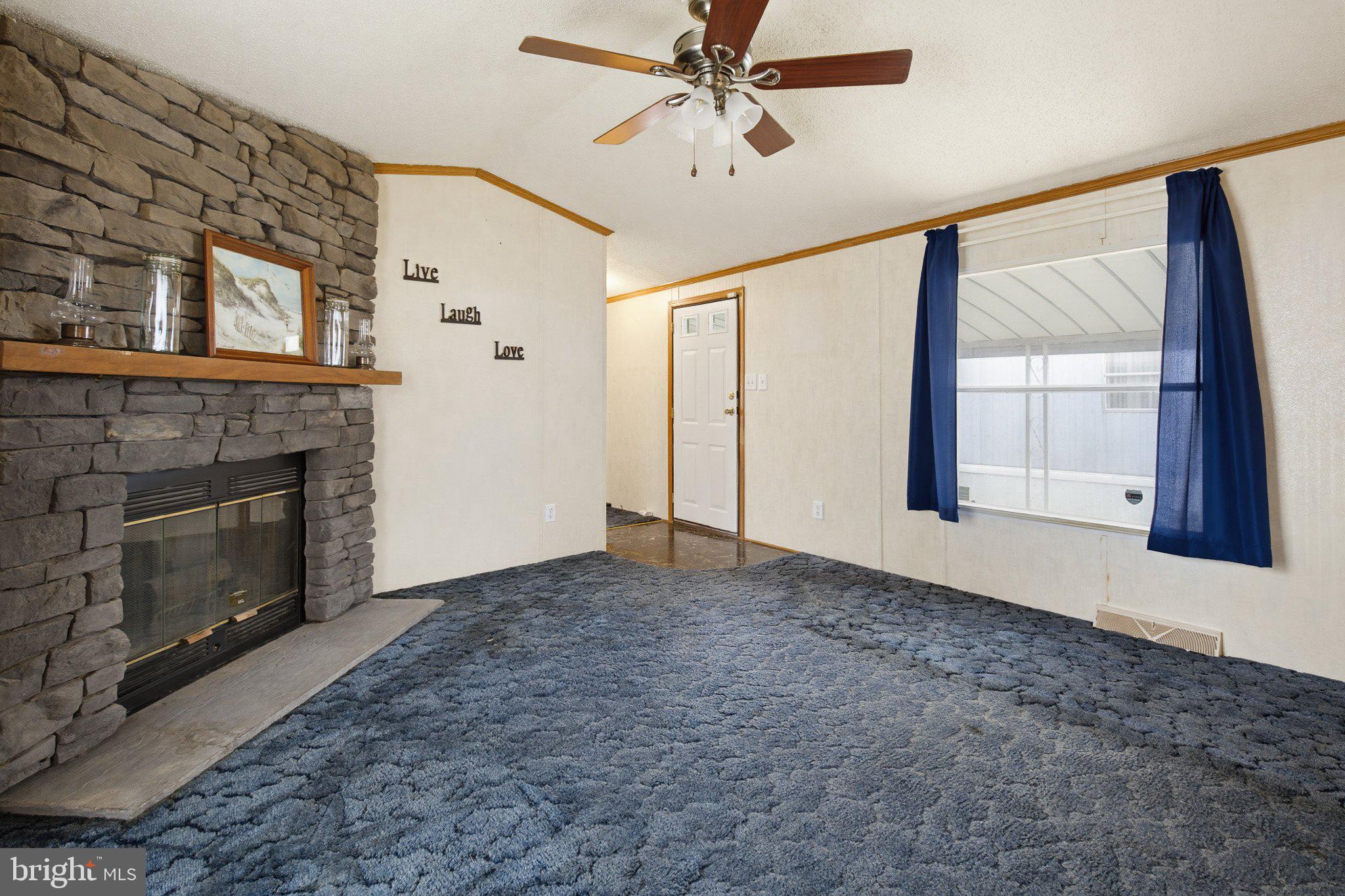 475 Wabash Road Ephrata, PA 17522 - Photo 9 of 33 Cozy living space with stone accents.