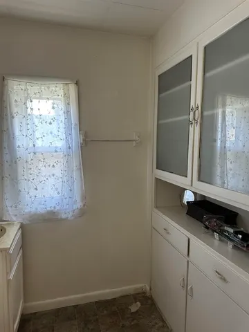 a room with storage and utility